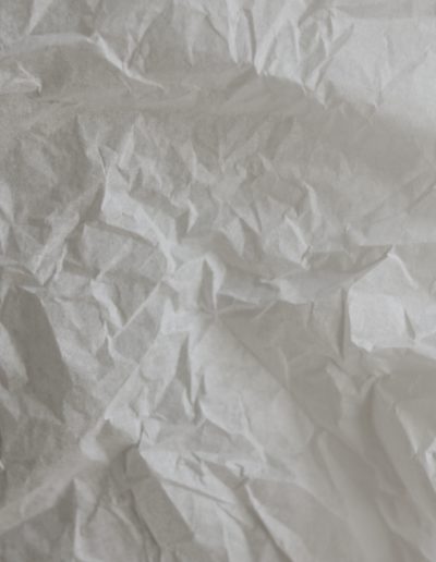white plastic pack on brown wooden table